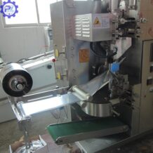 may dong goi tra tui loc 2 lop van hanh ben bi