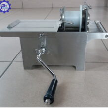 máy buộc đầu xúc xích quay tay