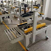 Máy Dán Băng Dính Thùng Carton FXJ6070 6 MAY DA2