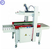 Máy Dán Băng Dính Thùng Carton FXJ-6050 7 may dan bang dinh thung carton fxlj 6050 duoc su dung rong rai