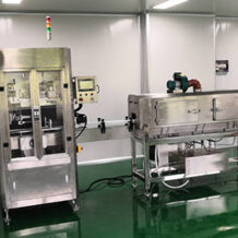 Máy Phóng Nhãn Màng Co Thân Chai 9 Máy phóng nhãn màng co thân chai