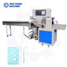 Máy đóng gói dụng cụ nha khoa sử dụng máy đóng gói nằm ngang