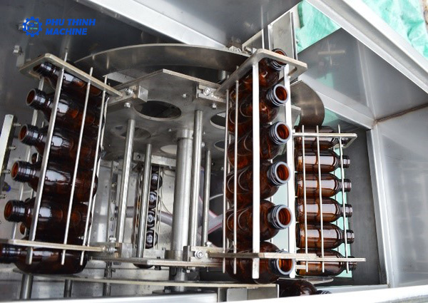 Máy rửa chai trong dây chuyền chiết rót vắc xin